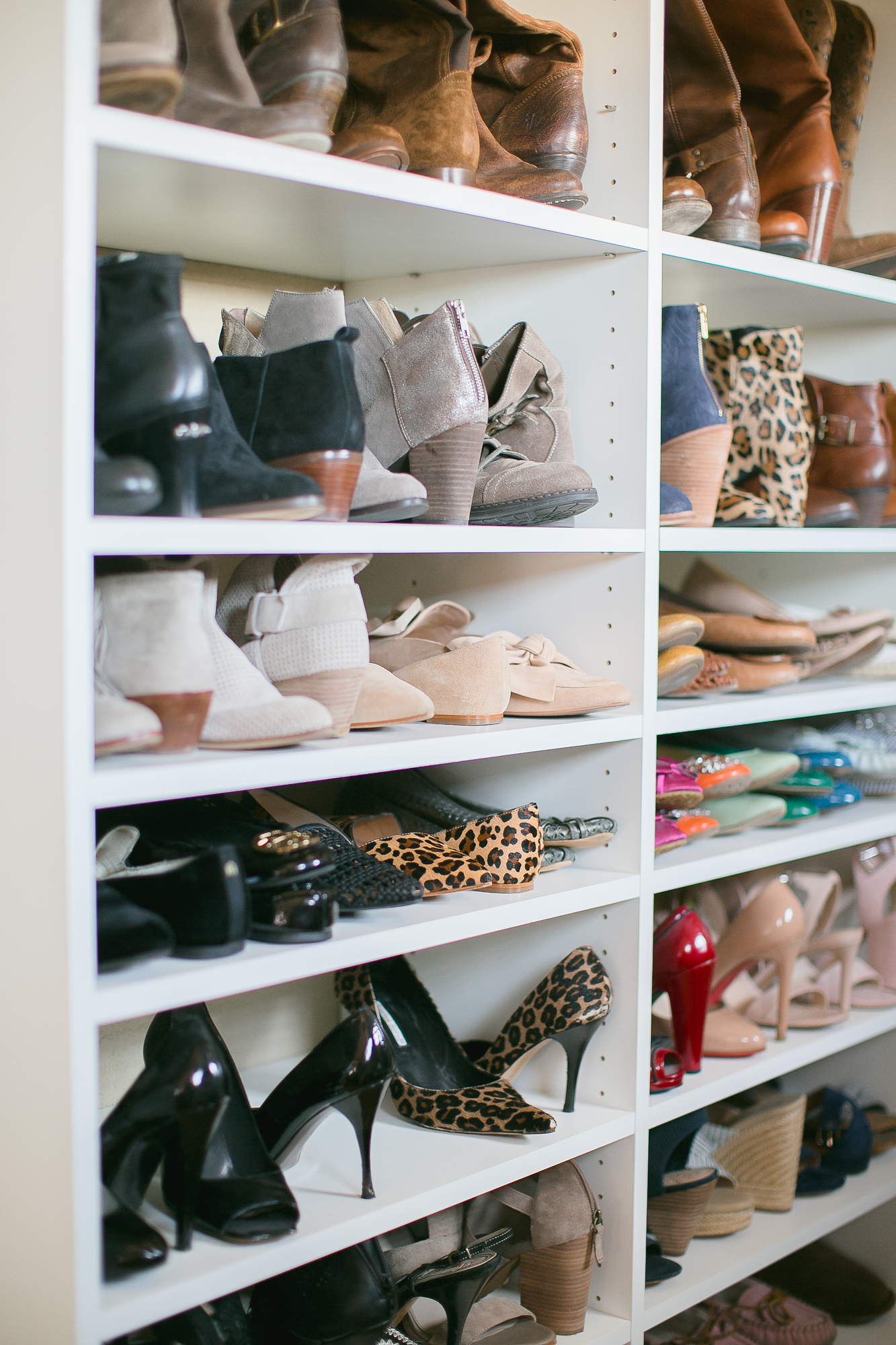 Custom white wood shoe shelves in Sacrametno