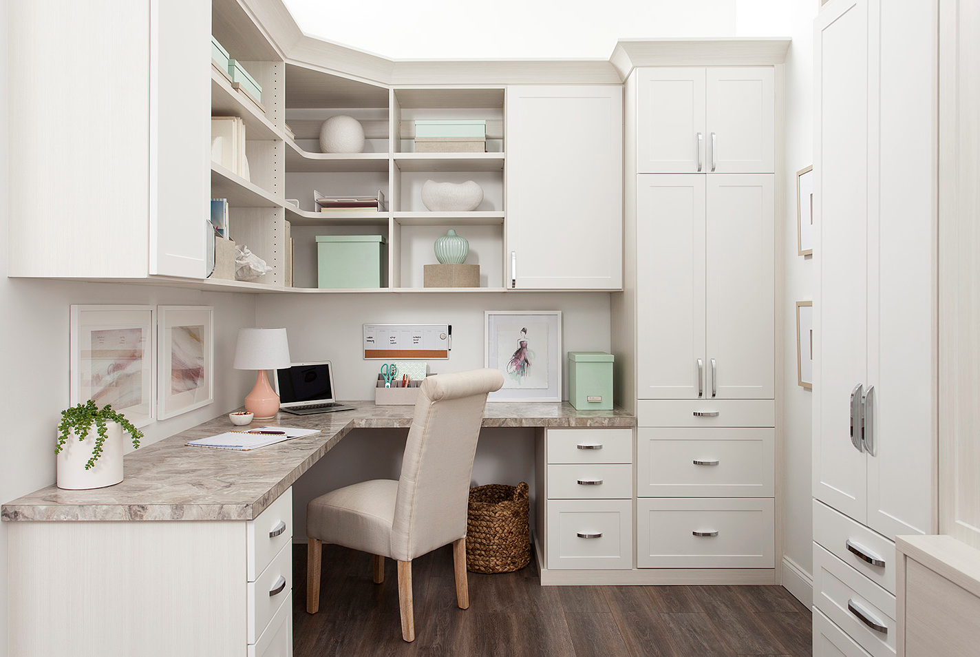 White custom built home office with drawers and storage hutch from Inspired Closets