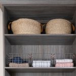Custom driftwood entryway with shelving and storage from Inspired Closets