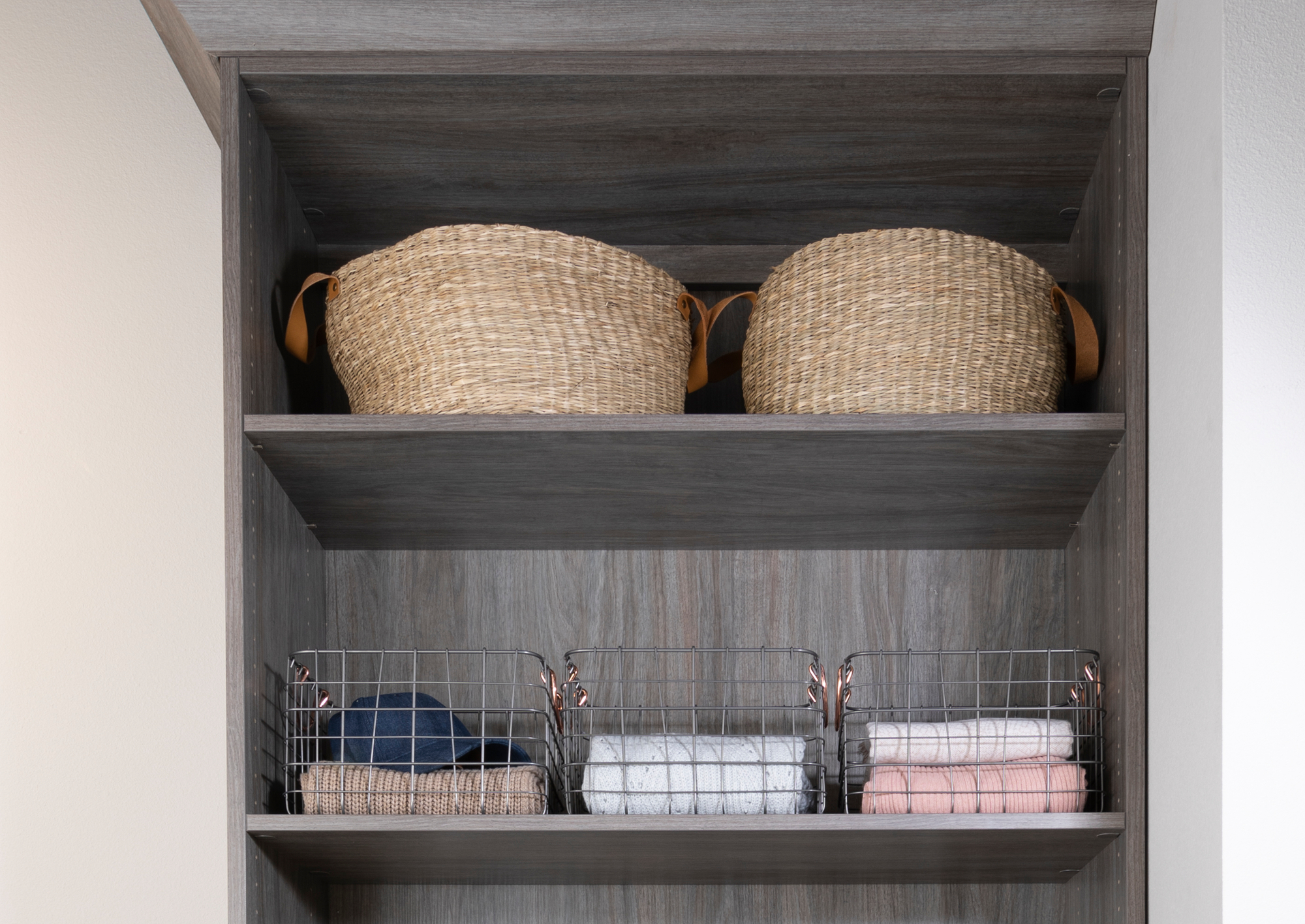 Custom driftwood entryway with shelving and storage from Inspired Closets