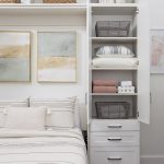 White Custom murphy bed with shelving with hutch and drawers from Inspired Closets