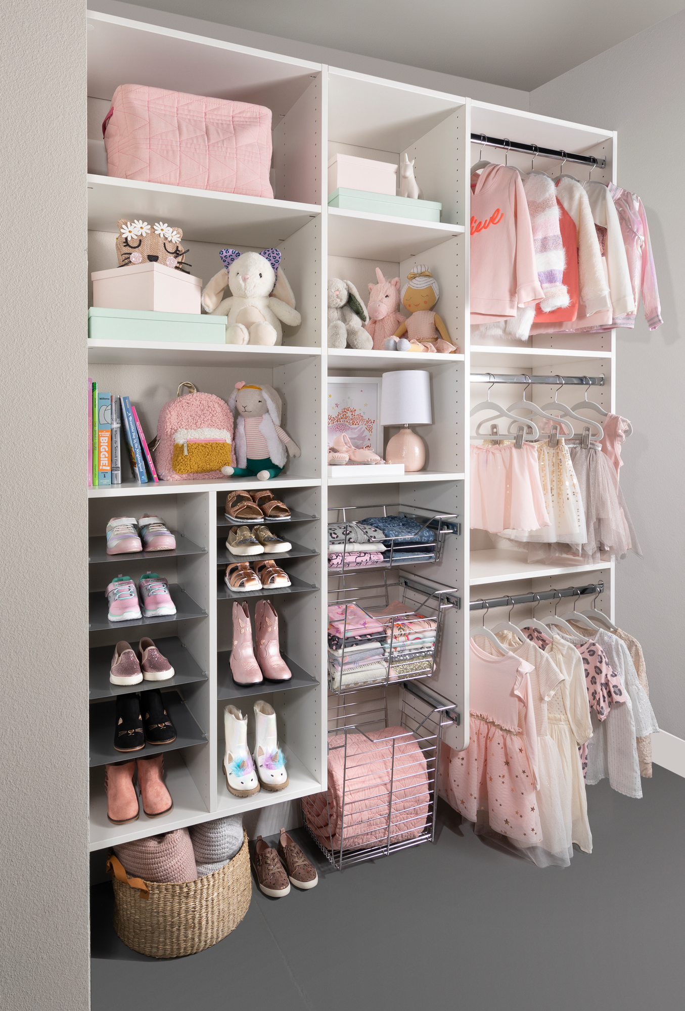 White little girls reach in closet with shoe and hanging storage in Las Vegas, NV