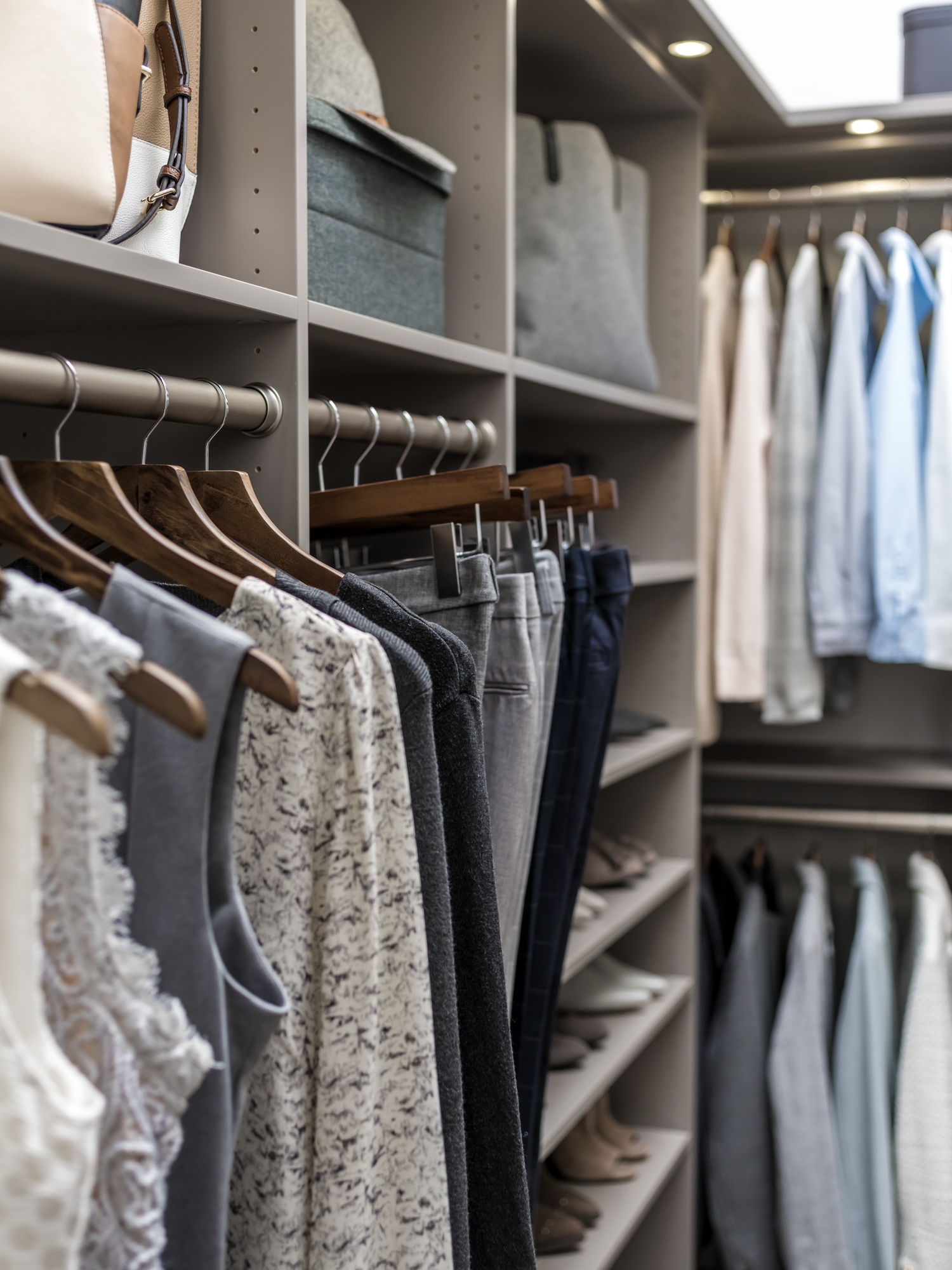 Hanging your pants store your shoes with a custom storage from Inspired Closets