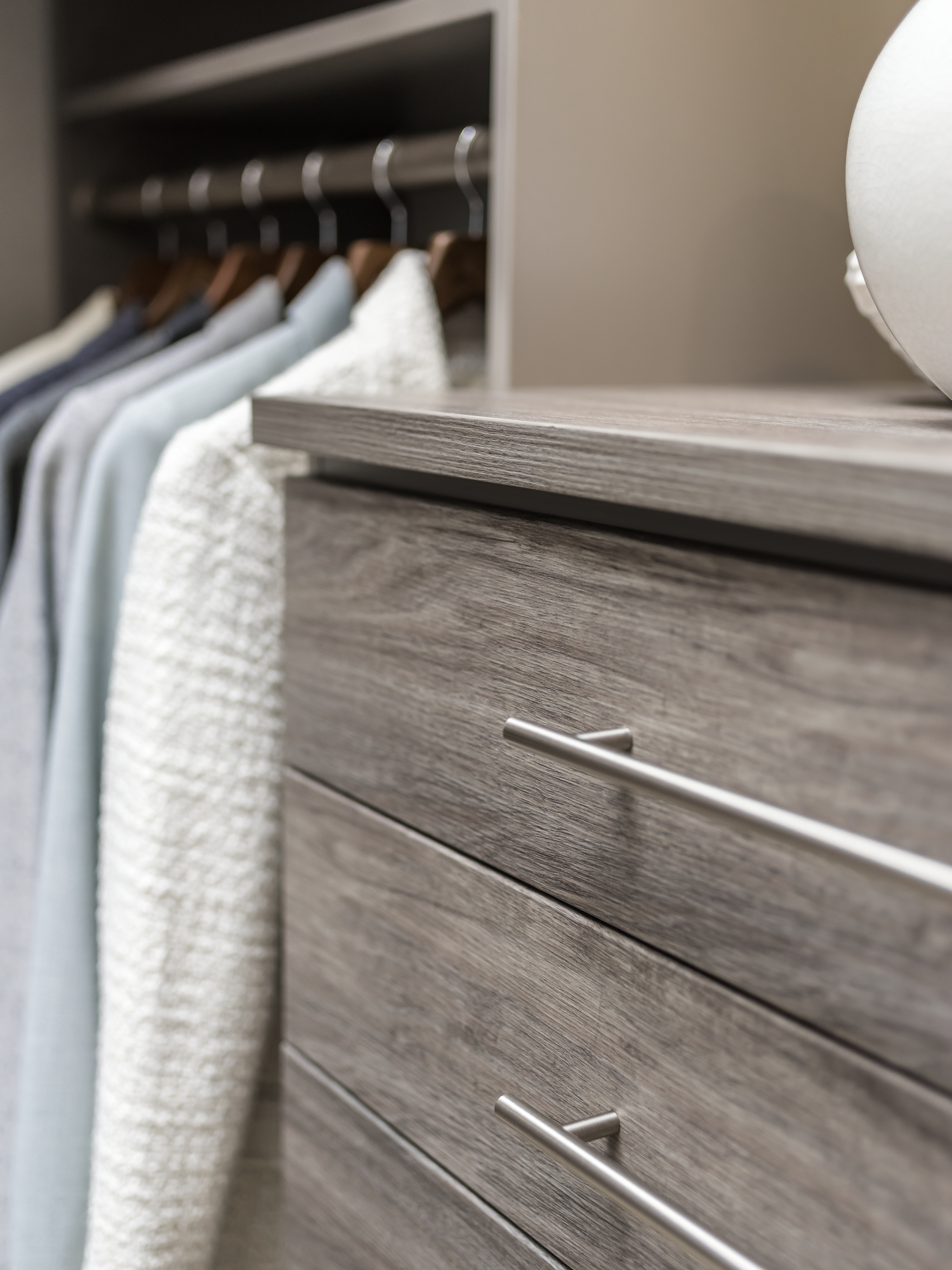 Custom bank of drawer storage from Inspired Closets