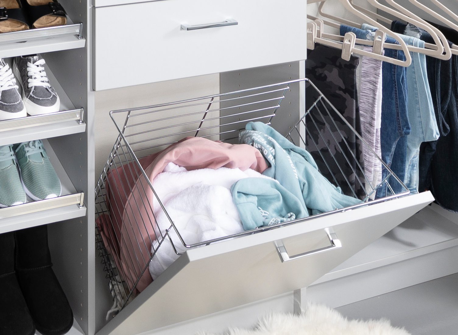 Silver pull out hamper for a closet from Inspired Closets