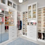 Customboutiqueclosetinhoughtonwithshoeshrineshelving,built indrawersandmirrordoors