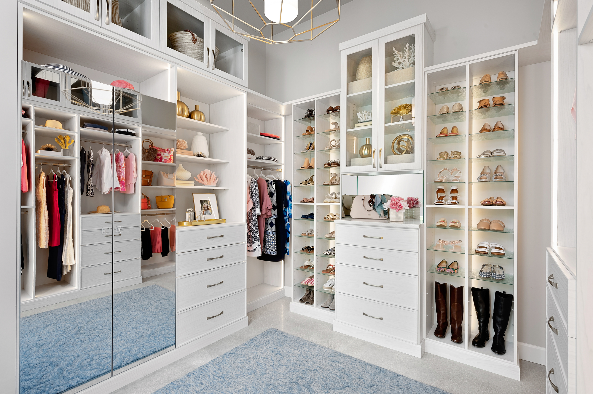 Customboutiqueclosetinhoughtonwithshoeshrineshelving,built indrawersandmirrordoors