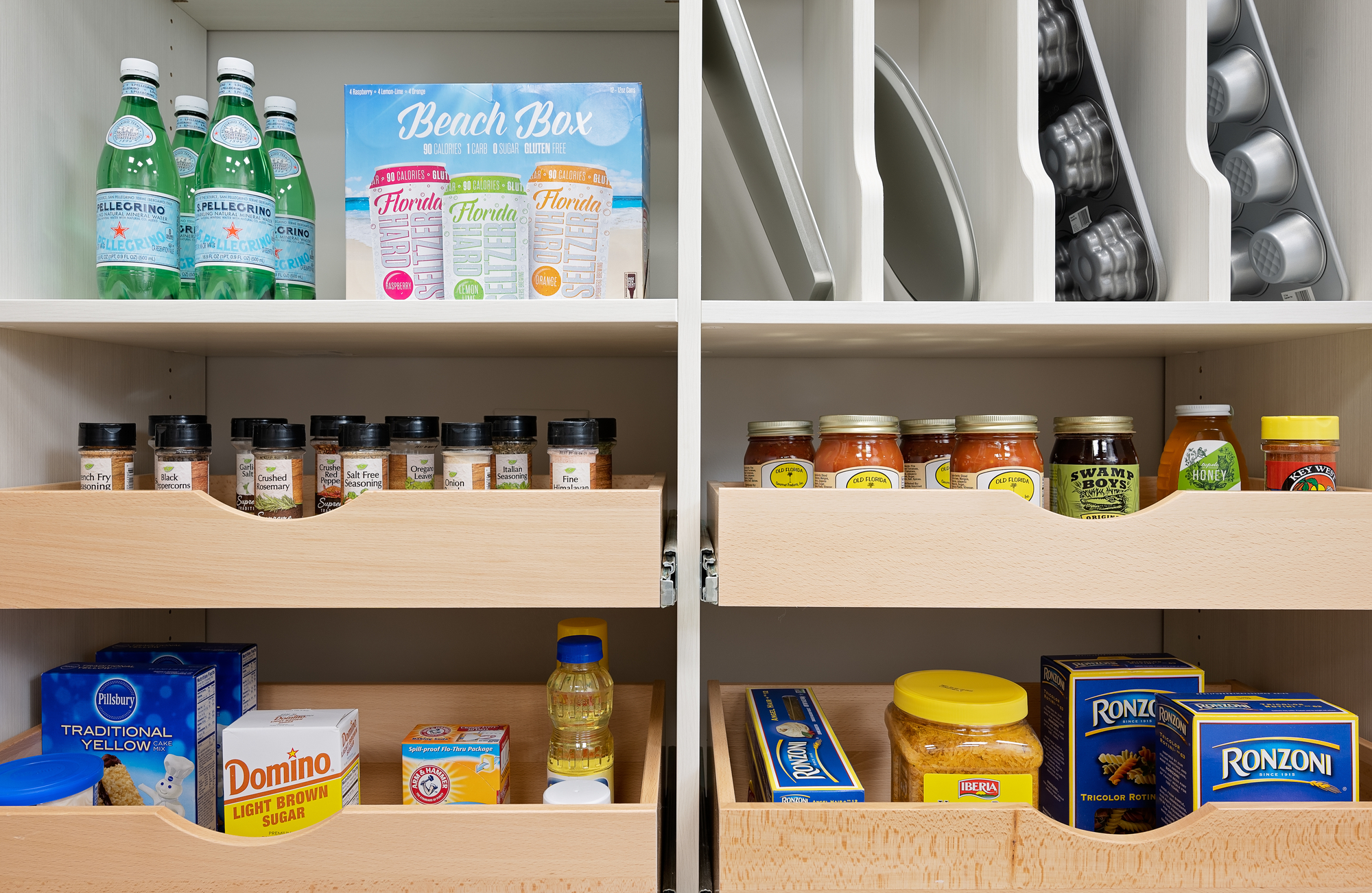 Custom pantry storage system with shelving for cans and spices in Port St. Lucie, Florida