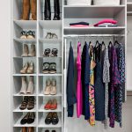 Customgreywalk inclosetwithadjustableshoeorganizerandhangingrodsinVeroBeach,Florida