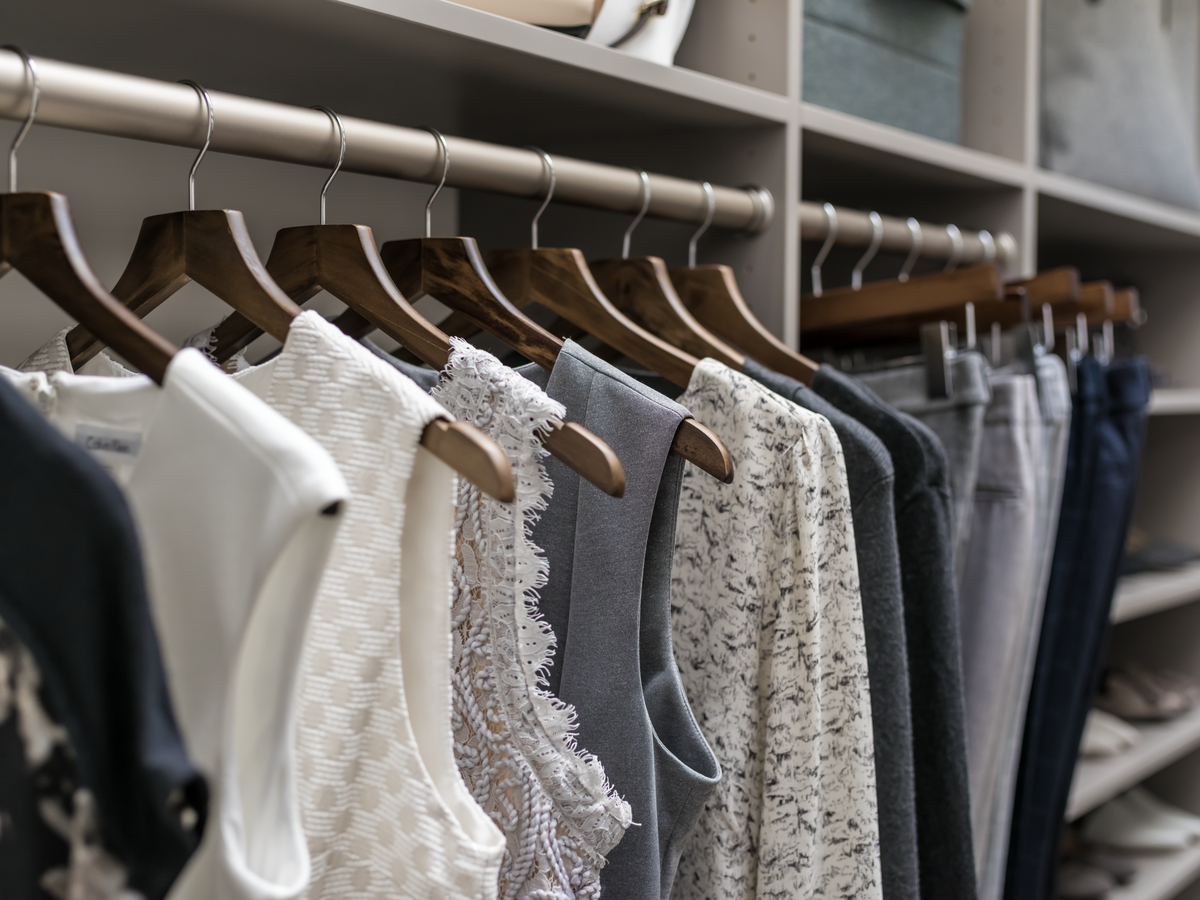 Women's hanging cloths in an Inspired Closets custom closet