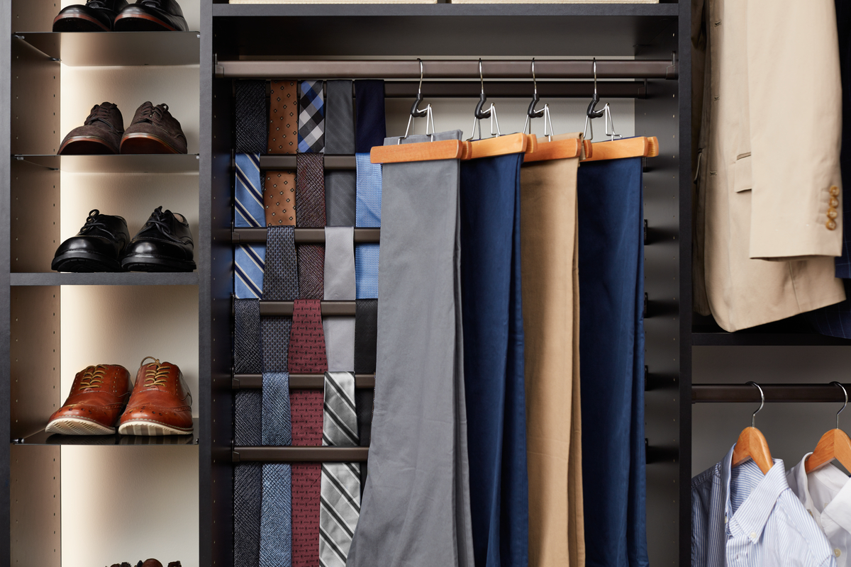 Shoe, tie and pant storage for a men's closet from Inspired Closets