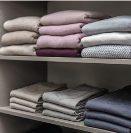 Organize your sweaters by colors with the help or Inspired Closets